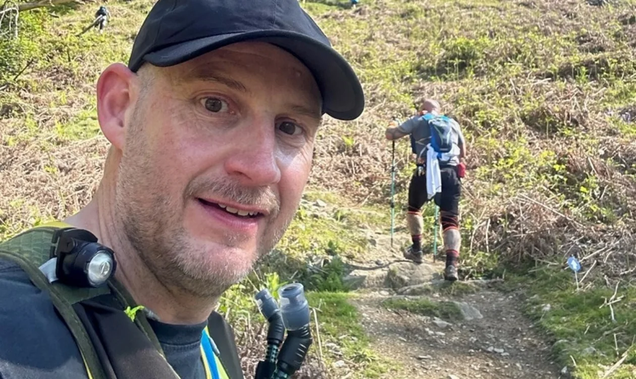 Lee Hammon, Yorkshire Cancer Research fundraiser, training in the countryside